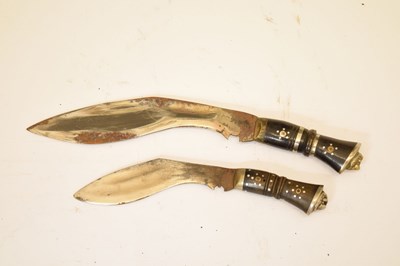 Lot 301 - Nepalese kukri of traditional form and three smaller kukris