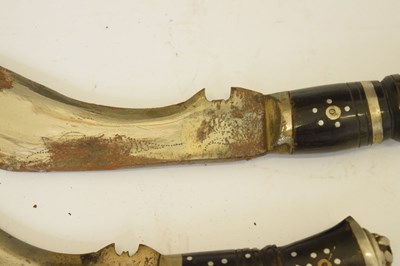 Lot 301 - Nepalese kukri of traditional form and three smaller kukris