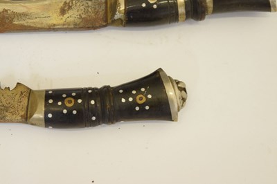 Lot 301 - Nepalese kukri of traditional form and three smaller kukris