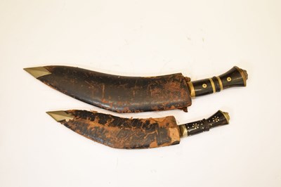 Lot 301 - Nepalese kukri of traditional form and three smaller kukris