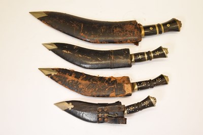 Lot 301 - Nepalese kukri of traditional form and three smaller kukris