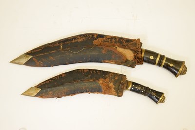 Lot 301 - Nepalese kukri of traditional form and three smaller kukris