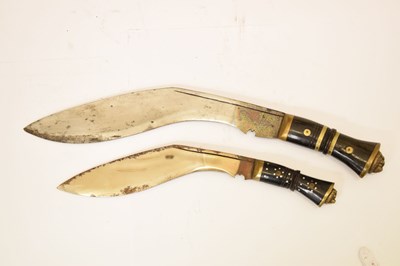 Lot 301 - Nepalese kukri of traditional form and three smaller kukris