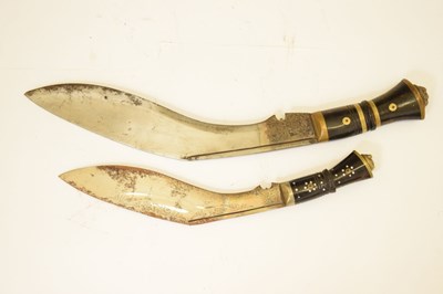 Lot 301 - Nepalese kukri of traditional form and three smaller kukris