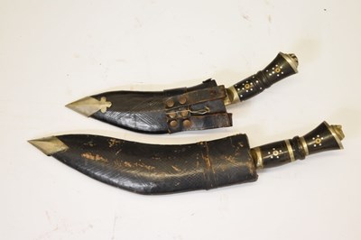 Lot 301 - Nepalese kukri of traditional form and three smaller kukris