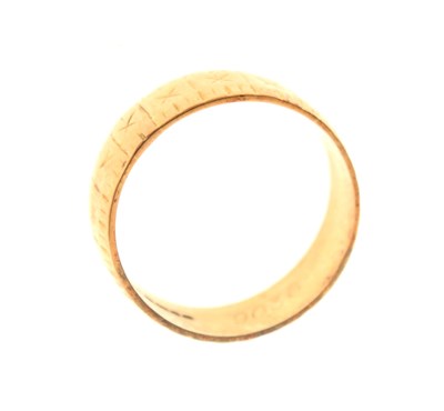 Lot 28 - 18ct gold textured wedding band