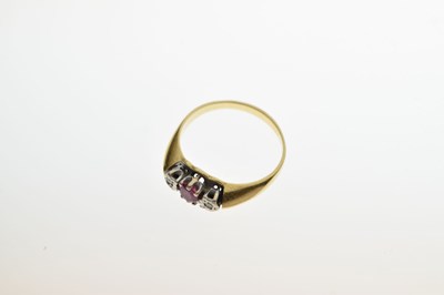 Lot 17 - Ruby and diamond three-stone ring