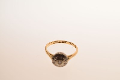 Lot 15 - 18ct gold illusion set diamond cluster ring