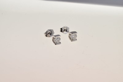 Lot 49 - Pair of single stone diamond ear studs