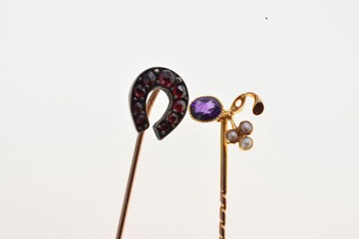 Lot 65 - A stone set horseshoe stick pin