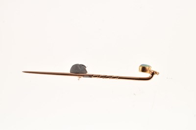 Lot 57 - An opal and diamond set stick pin