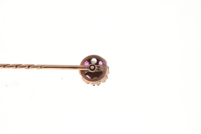Lot 58 - A diamond, ruby and pearl cluster stick pin