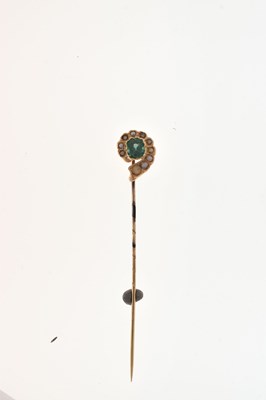 Lot 61 - A garnet topped doublet and seed pearl set stick pin