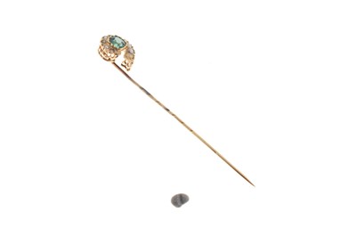 Lot 61 - A garnet topped doublet and seed pearl set stick pin