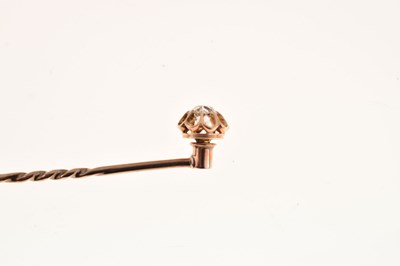 Lot 62 - A single stone diamond stick pin