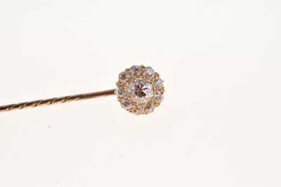 Lot 63 - A diamond cluster stick pin