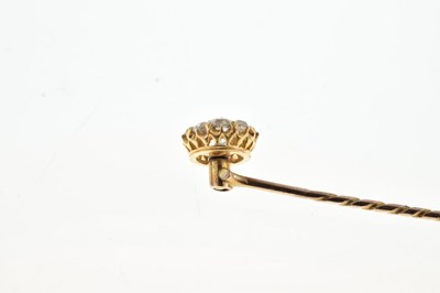 Lot 63 - A diamond cluster stick pin