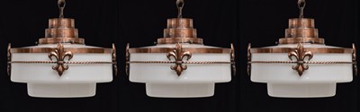 Lot 667 - Set of three opaque glass Art Deco pendant lights