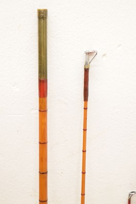 Lot 236 - Eight split cane and other fishing rods to include