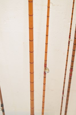 Lot 236 - Eight split cane and other fishing rods to include
