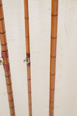 Lot 236 - Eight split cane and other fishing rods to include