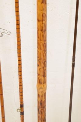 Lot 236 - Eight split cane and other fishing rods to include