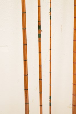 Lot 236 - Eight split cane and other fishing rods to include
