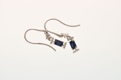 Lot 44 - 9ct white gold step cut sapphire and diamond pendant and earrings