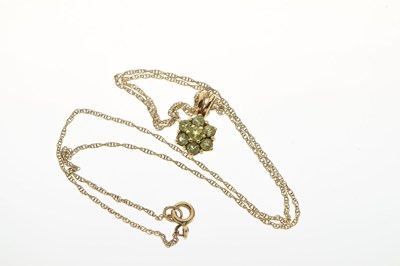 Lot 49 - 9ct gold peridot cluster pendant and earrings set