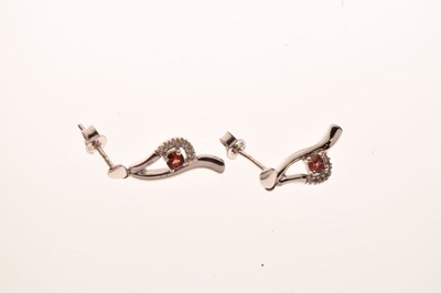 Lot 47 - 9ct white gold garnet and diamond cluster pendant and earrings
