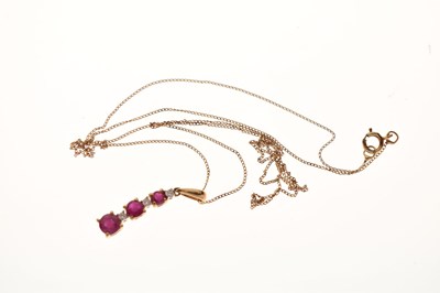 Lot 57 - Ruby and diamond pendant and earring set