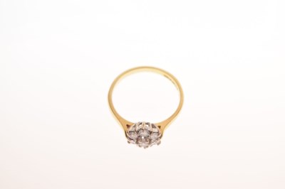 Lot 12 - 18ct gold, seven-stone diamond cluster ring