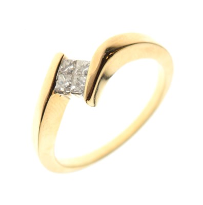 Lot 13 - 18ct gold invisible set four-stone princess cut ring