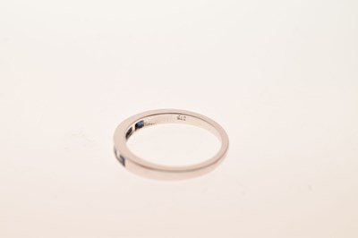 Lot 35 - 9ct white gold half hoop eternity ring, channel set square cut sapphires and baguette cut diamonds