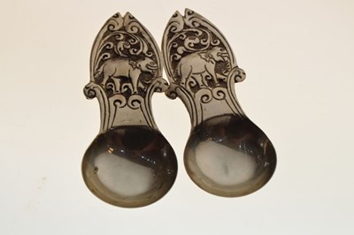 Lot 126 - Two white metal caddy spoons with elephant decoration