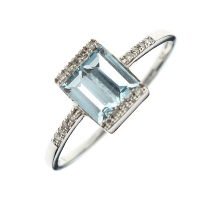 Lot 56 - 9ct white gold, blue topaz and diamond dress ring