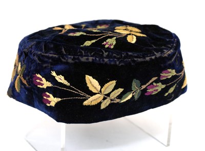 Lot 311 - Embroidered dark navy velvet nightcap