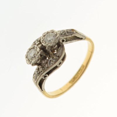 Lot 24 - Two-stone diamond crossover ring