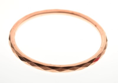 Lot 143 - 9ct rose gold hollow bangle