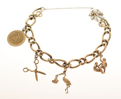 Lot 120 - A 9ct gold charm bracelet