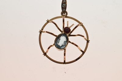 Lot 33 - Seed pearl and paste set spider pendant