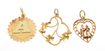 Lot 104 - Three gold pendants