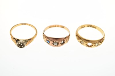 Lot 20 - Three gold rings comprising an 18ct gold gypsy set ring