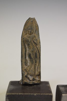 Lot 470 - Three Thai cast metal amulets