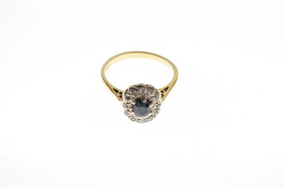 Lot 28 - Sapphire and diamond cluster ring