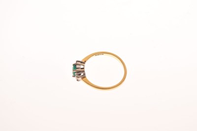 Lot 30 - 18ct gold, emerald and diamond three stone ring