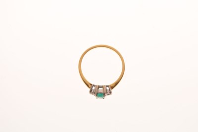 Lot 30 - 18ct gold, emerald and diamond three stone ring