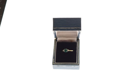 Lot 30 - 18ct gold, emerald and diamond three stone ring