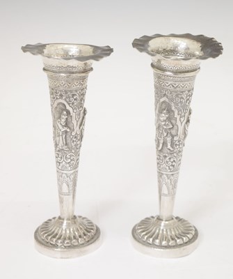 Lot 245 - Two Indian white metal bud vases