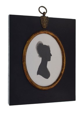 Lot 556 - Oval silhouette on plaster of a lady